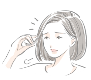 「白髪染め、そろそろやめたいかも…」と悩む女性のイラスト